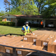 Workers hand out food donations in Helena. After the storm cut off power, many residents lost food they had stockpiled.